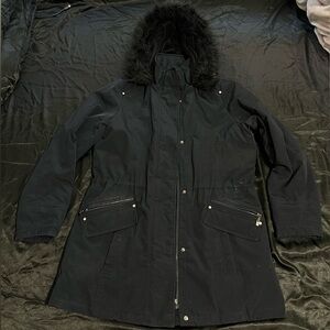 Blue Ski Jacket with Fur-Trimmed Hood and Weather-Resistant Fabric